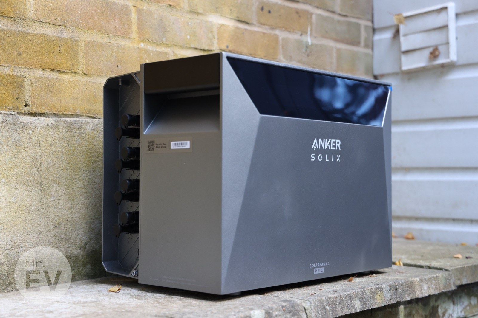 The Solarbank 4 E5000 Pro with its side bay open: eight solar connectors, a pair for each tracker