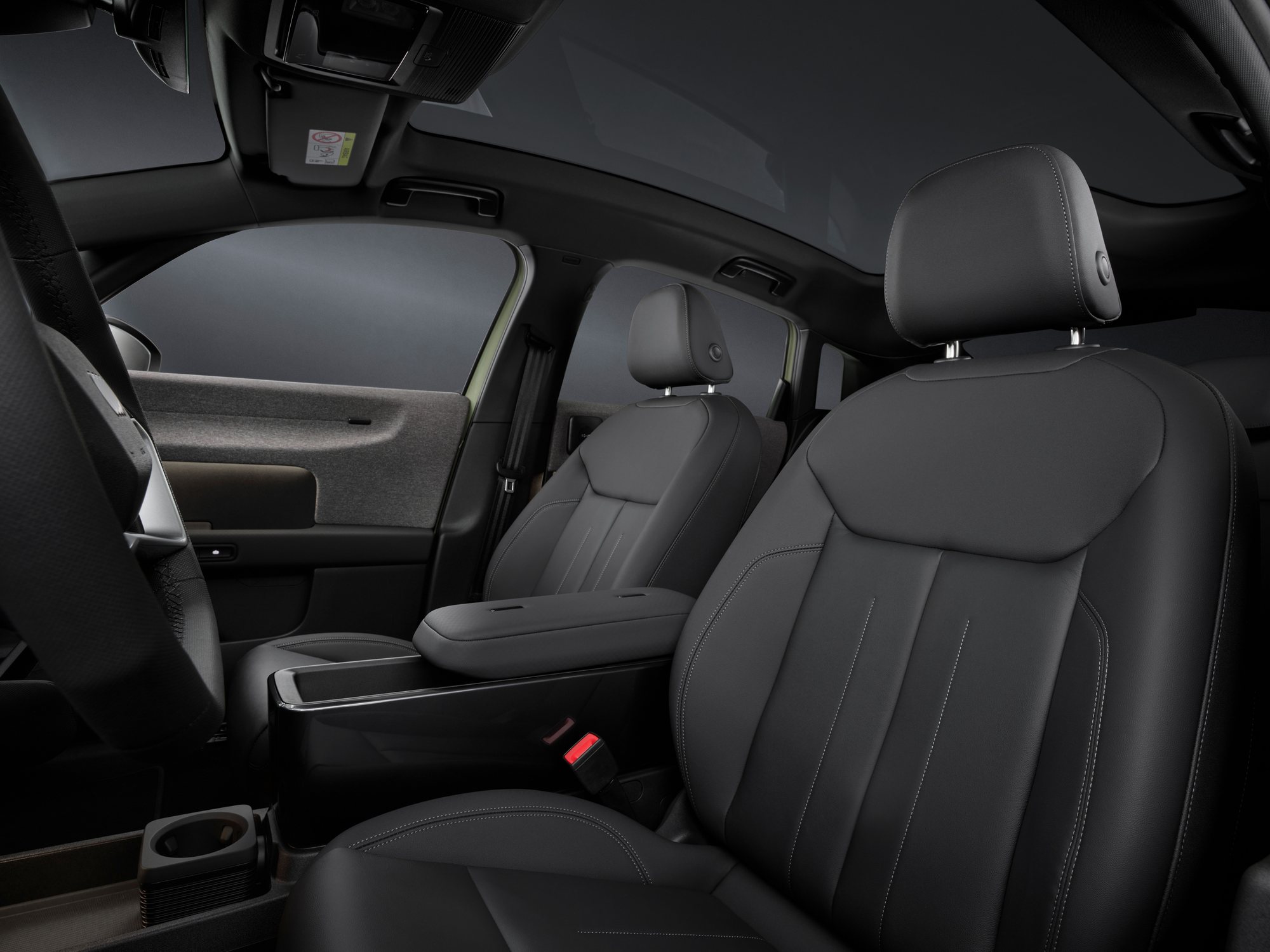 The front seats and the centre console, from the back