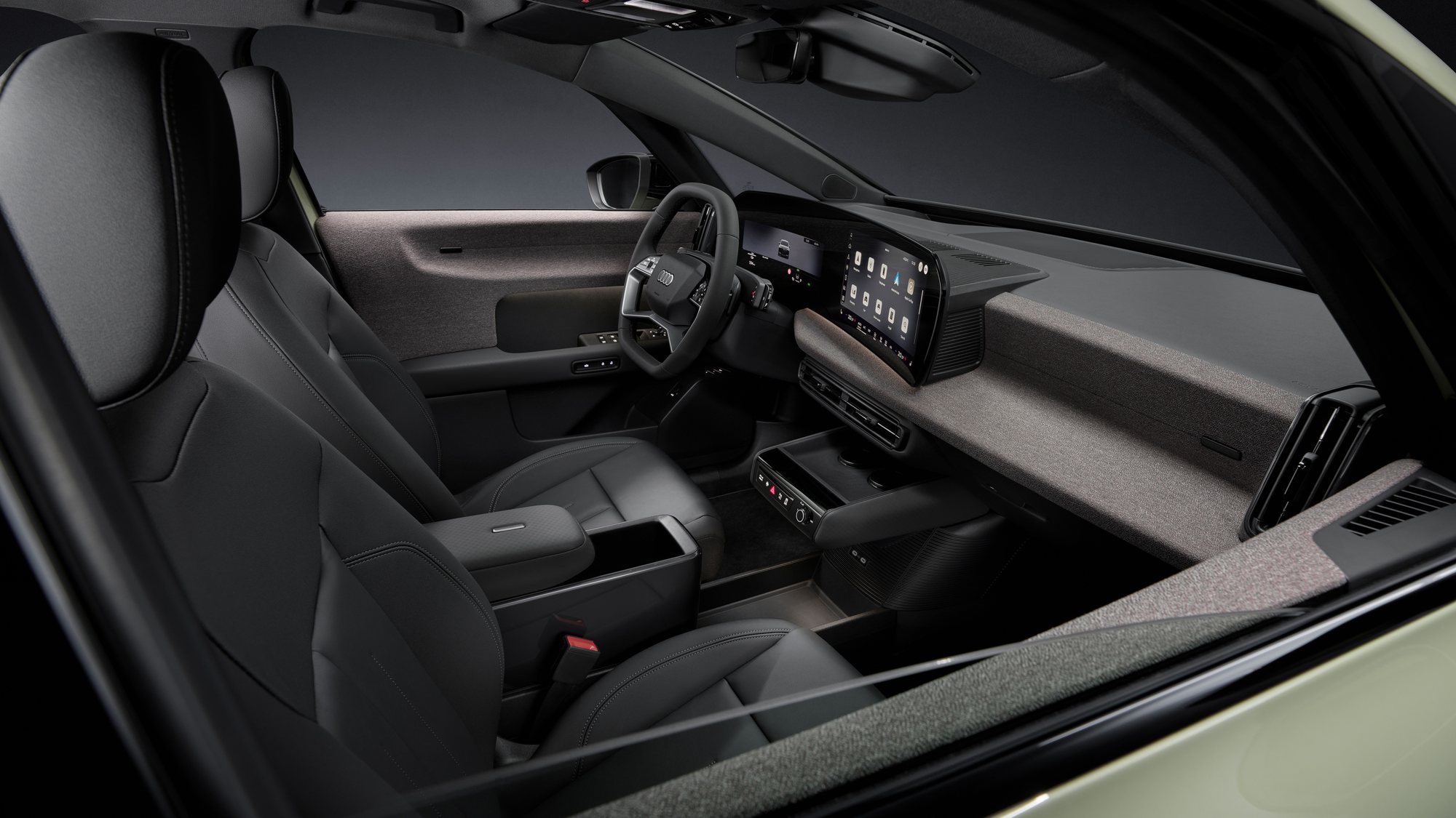 The cabin from the driver's side, and the fabric Softwrap across the dashboard