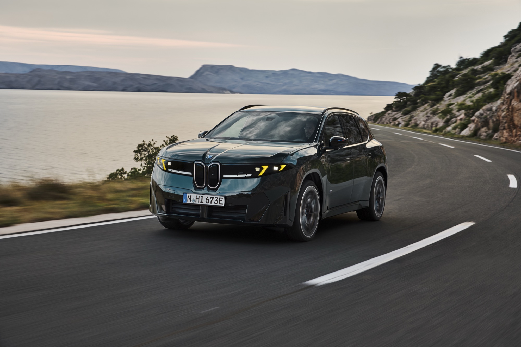 The BMW iX3 M60 xDrive, with its M Yellow Lights on