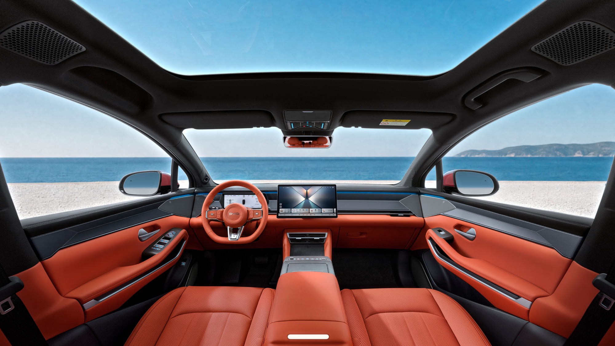 Inside, under the 2.39 m² glass roof, with the 15.6 inch screen