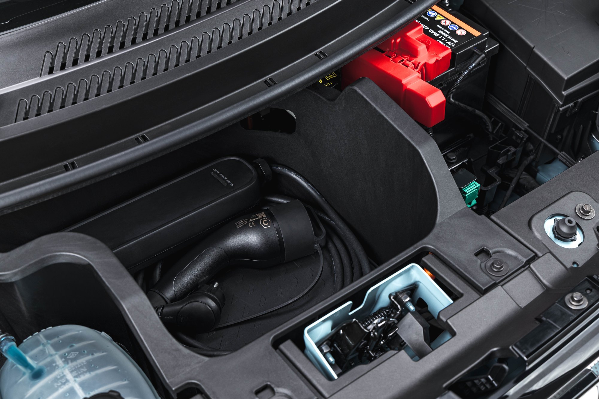 The optional 18 litre frunk, sized for the charging cable