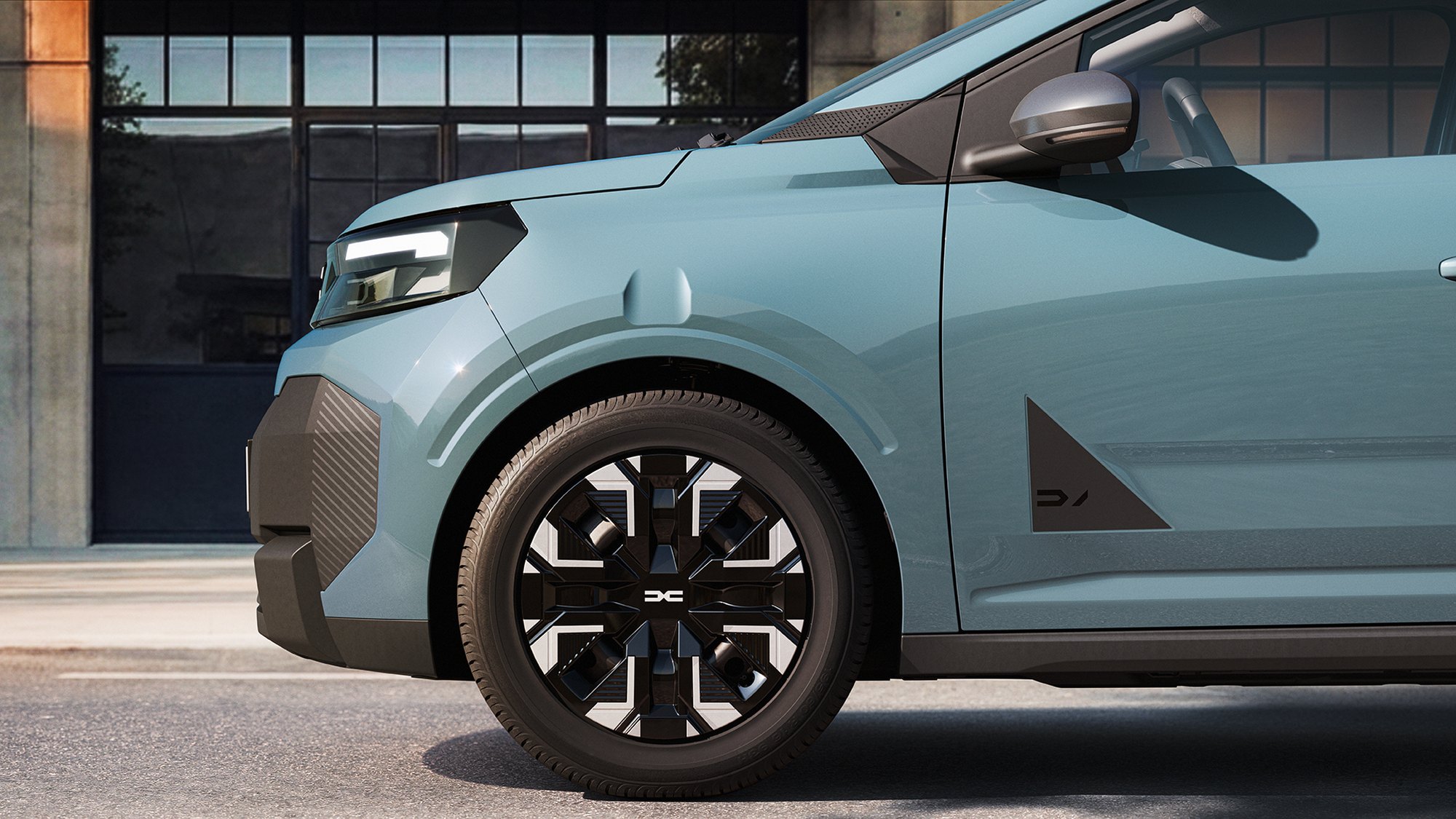 The short, high bonnet and the textured bumper cladding