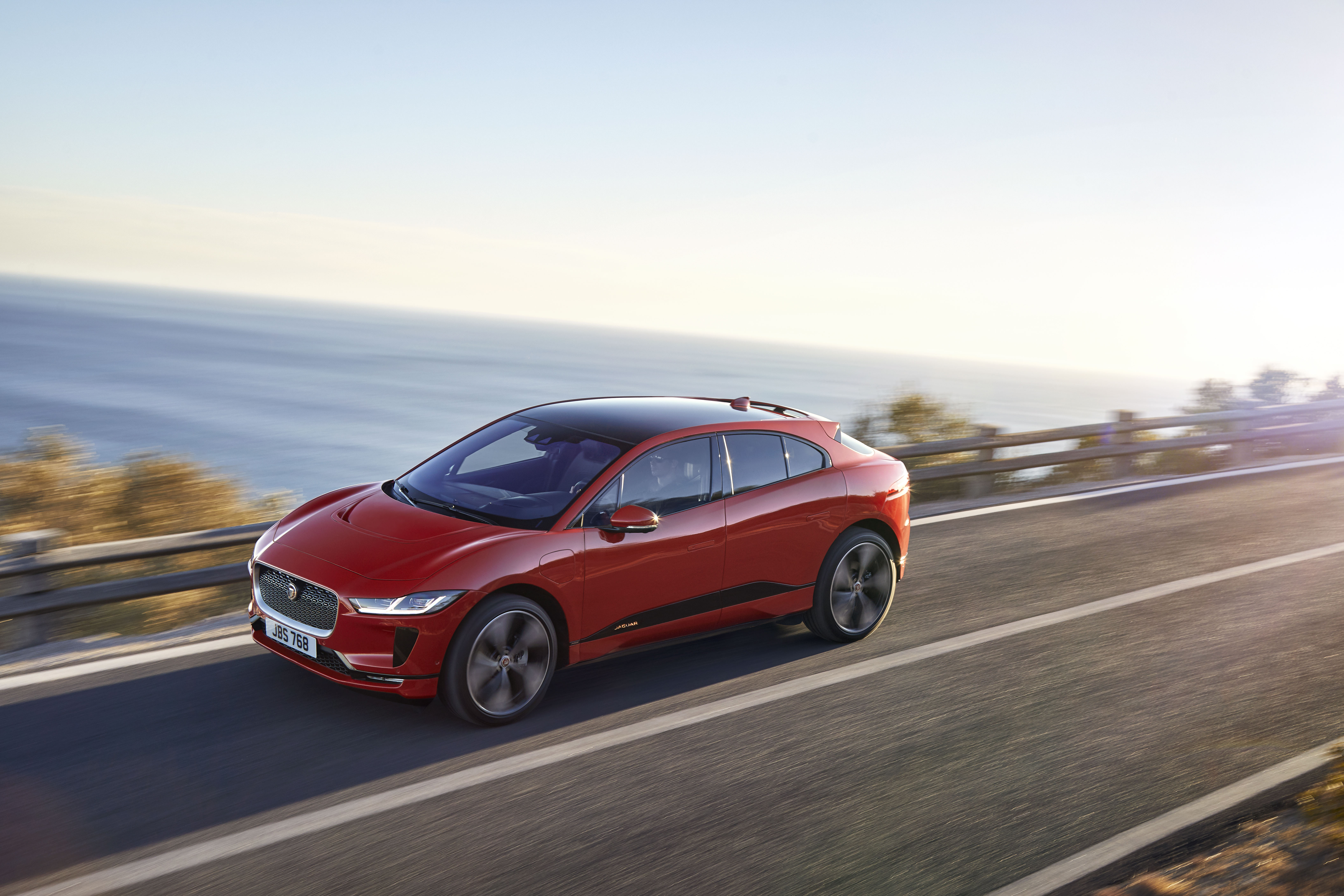 Red Jaguar I-Pace driving