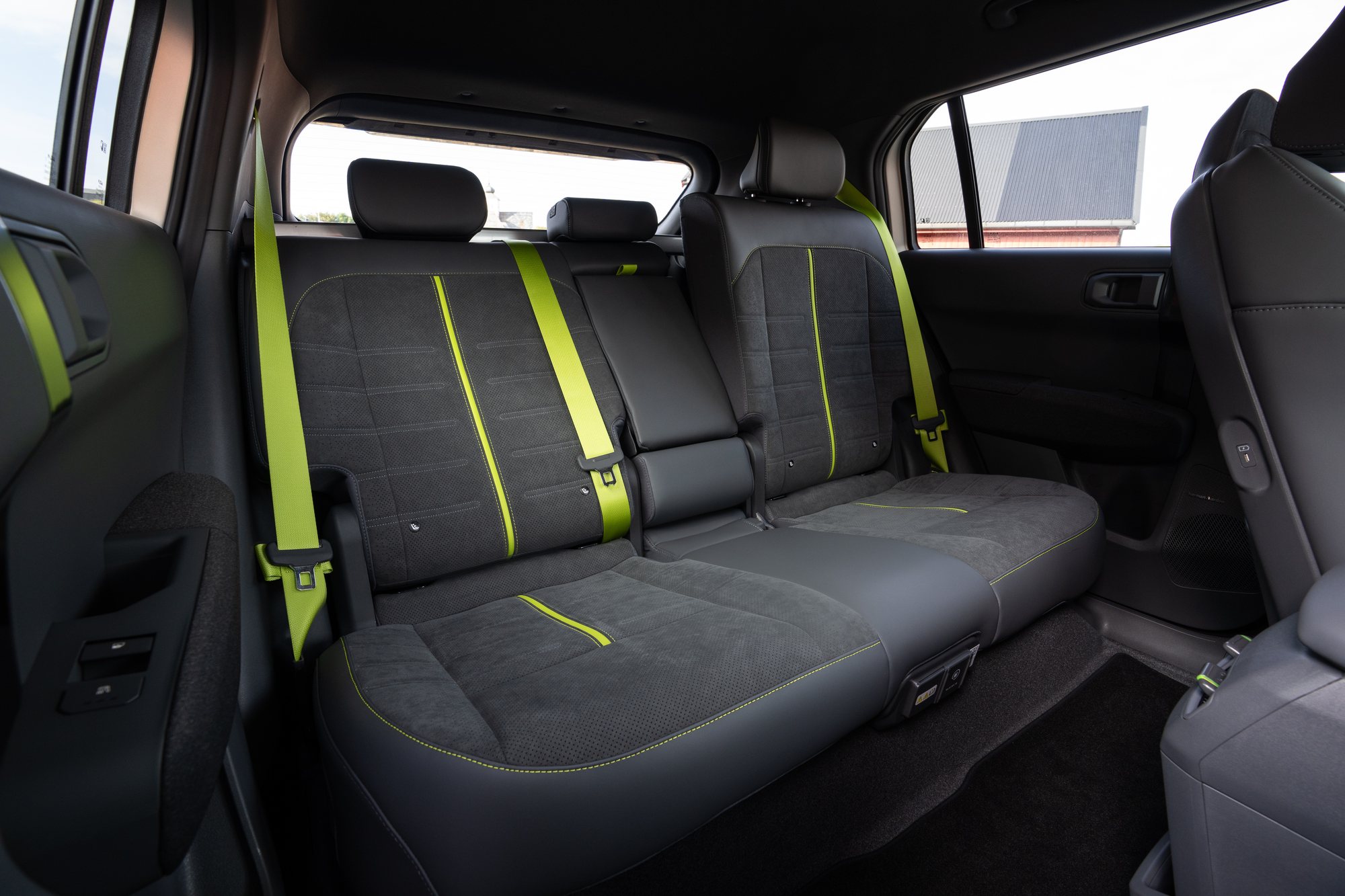 The back seats, and the neon-green belts