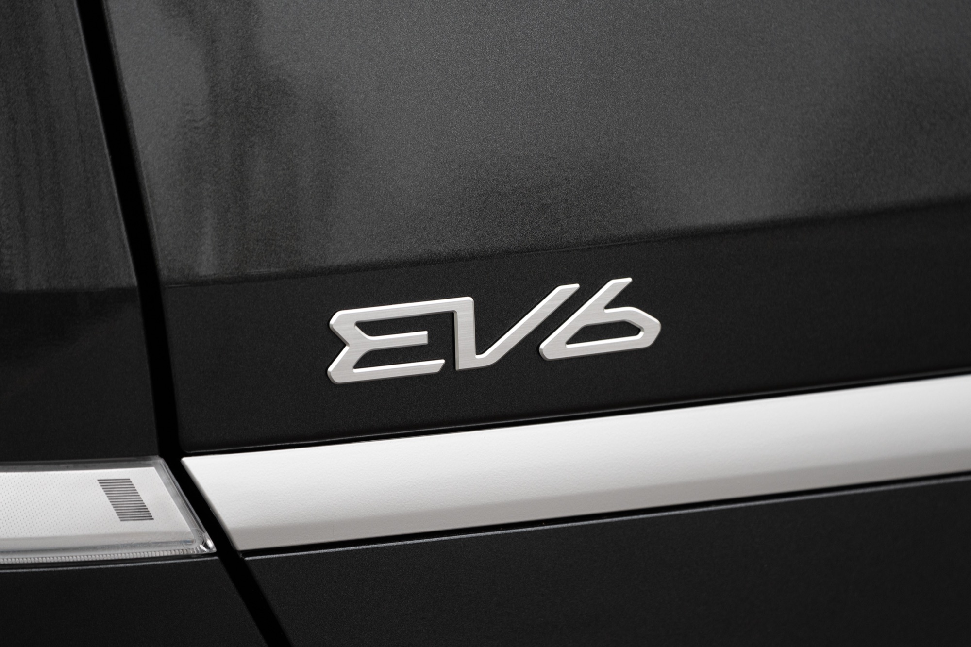 The EV6 badge on the Air's chrome door garnish