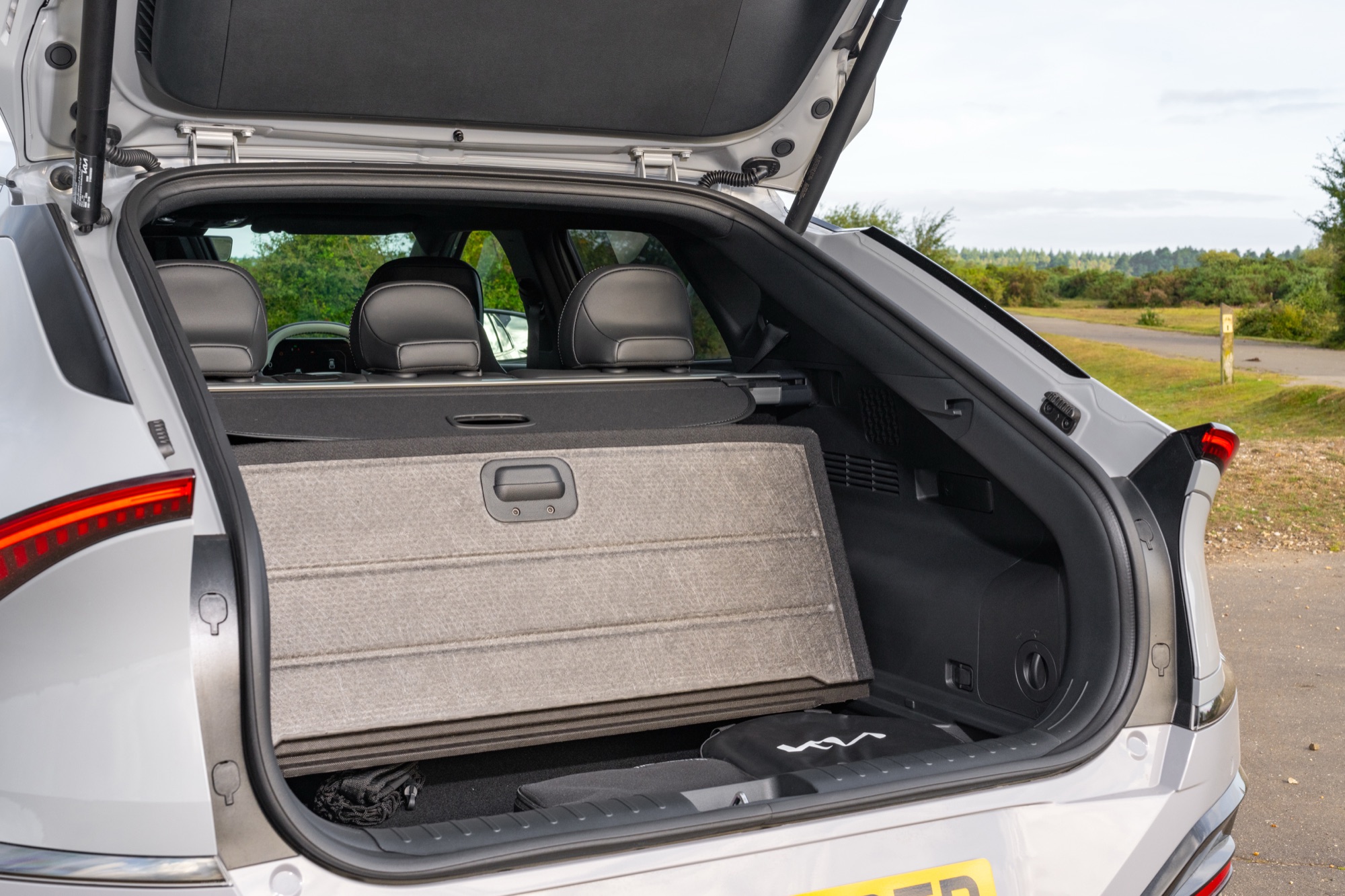 Storage under the boot floor