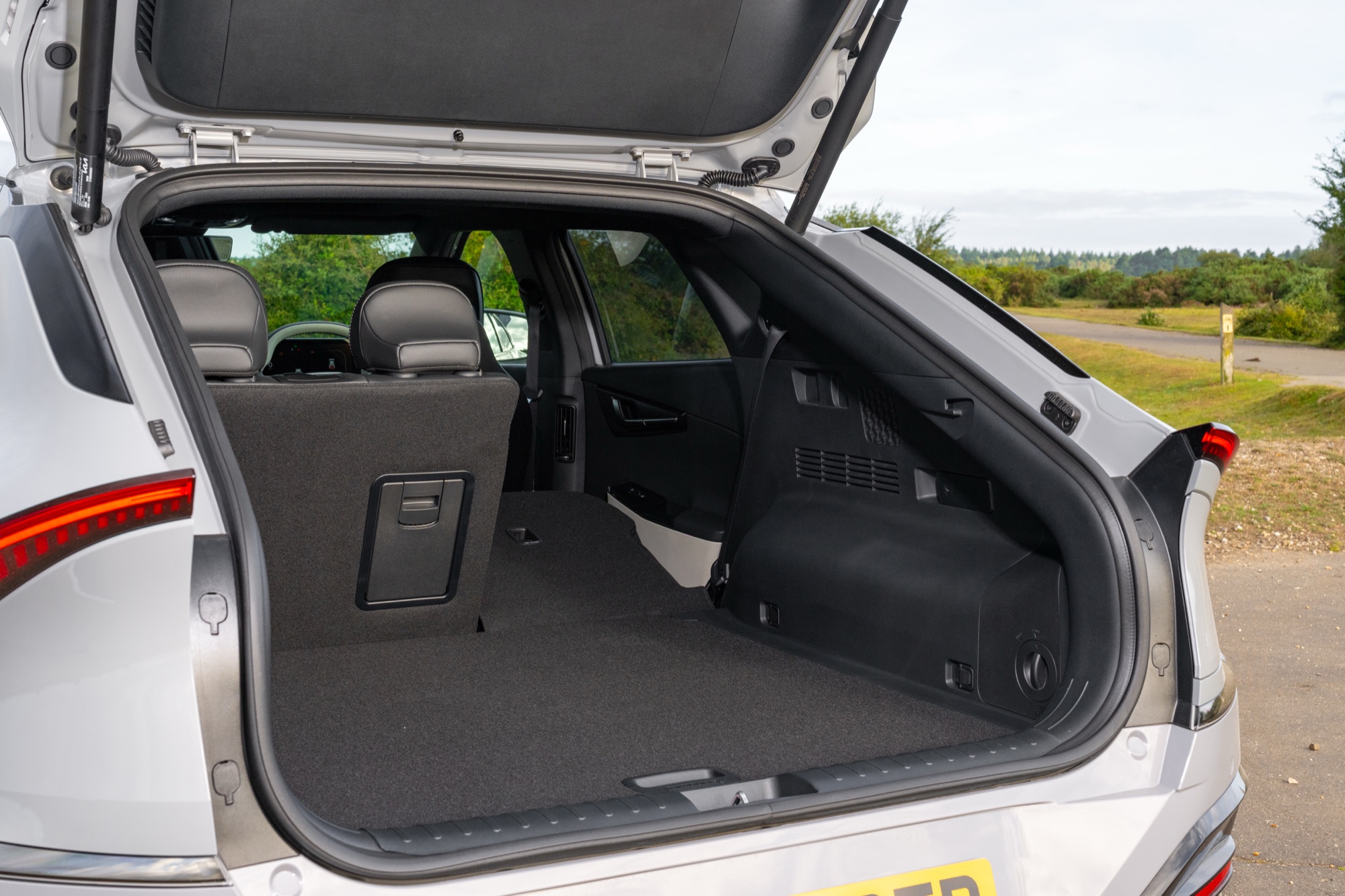 One side of the rear seat folded