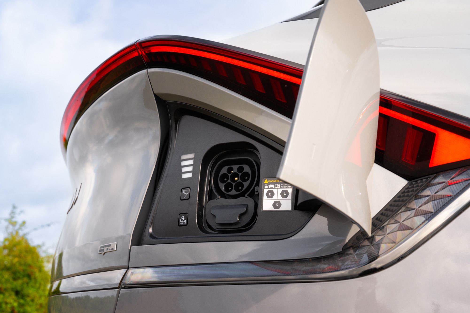The charging port, at the back on the right