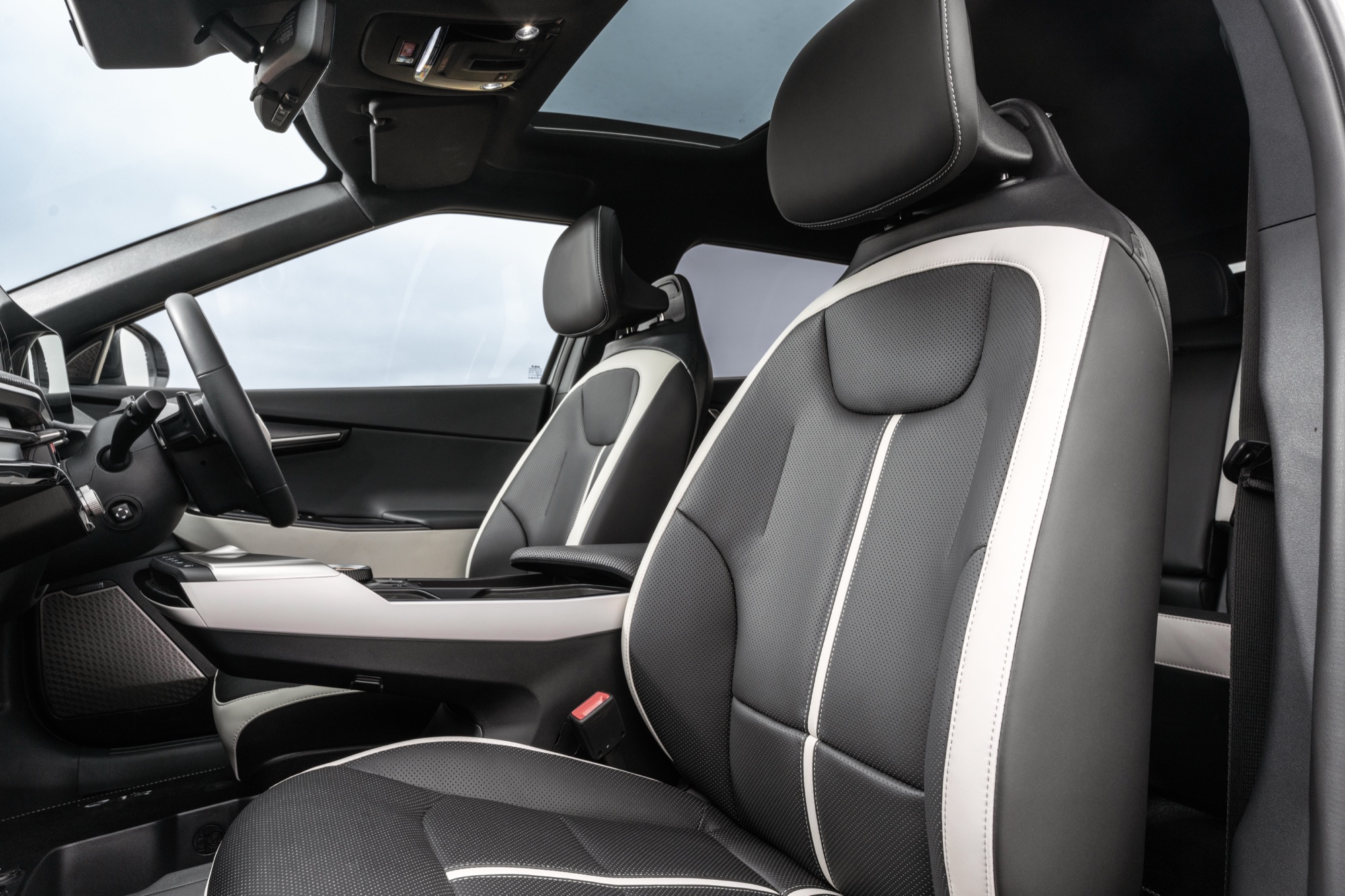 The front seats, under the sunroof