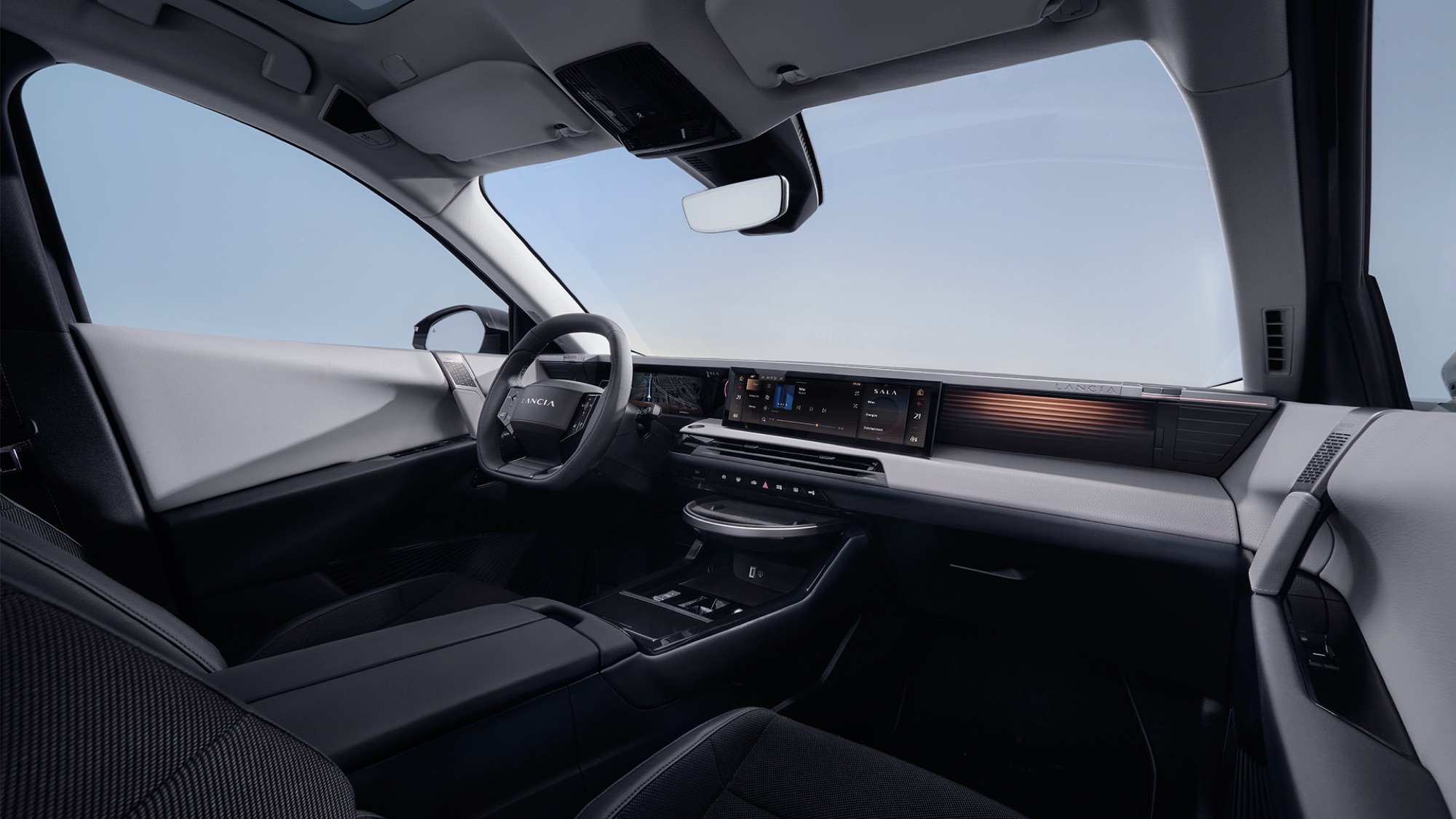 Inside the Gamma: the 10.25 and 16 inch screens, and the coffee table below them