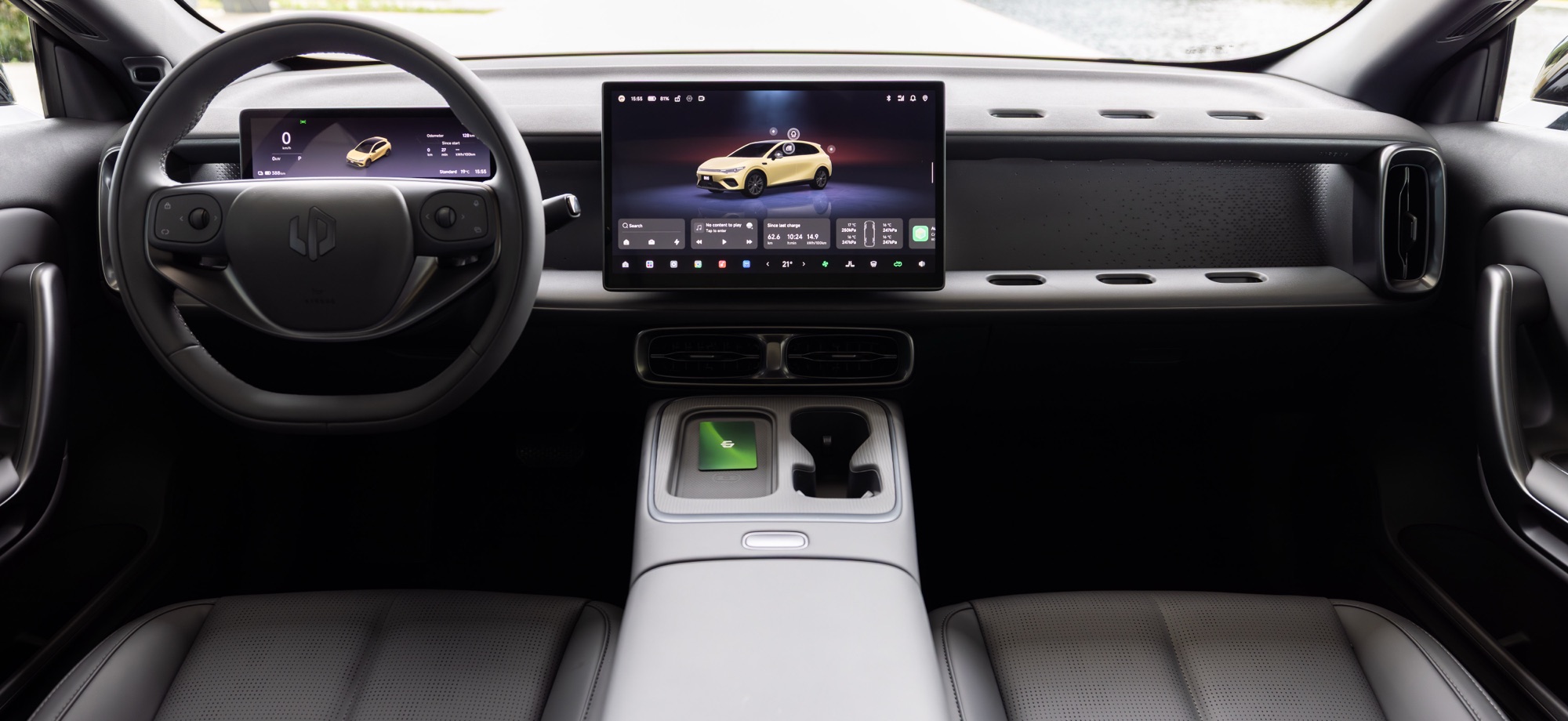 The B05's dashboard, 14.6 inch screen and wireless charger, in a left-hand drive car