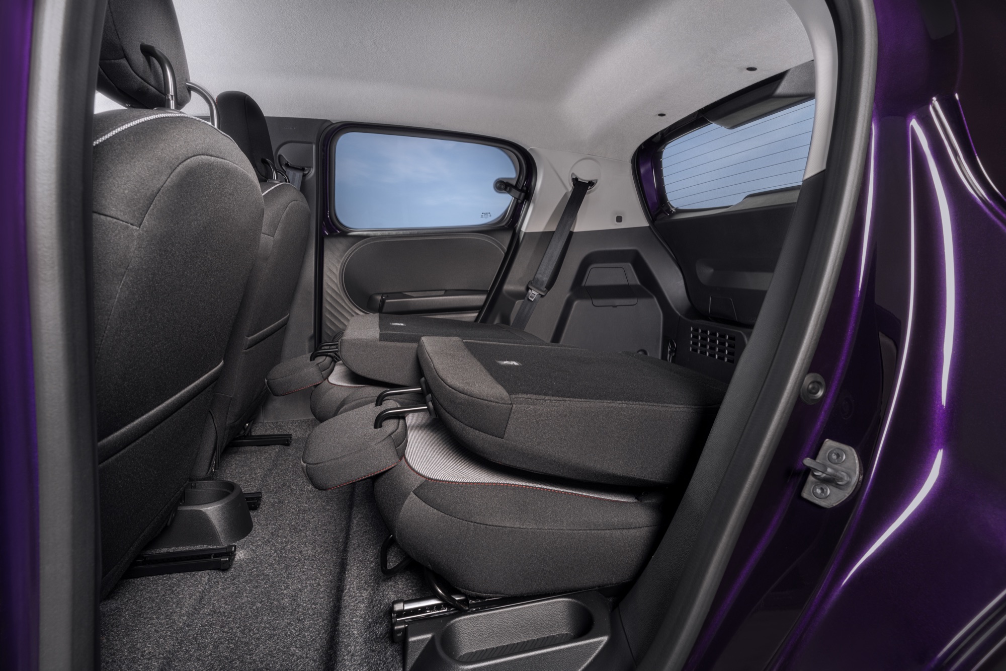 The rear seats, which slide independently, folded flat