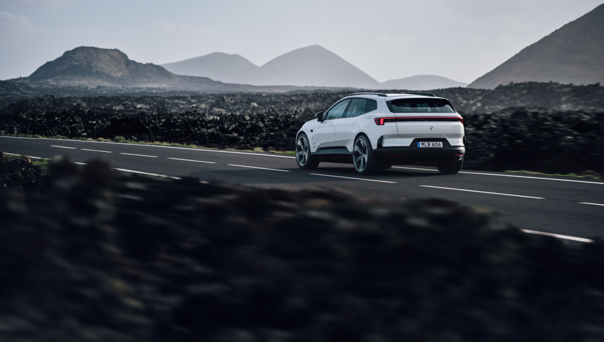 Polestar 4 SUV on the move, from behind