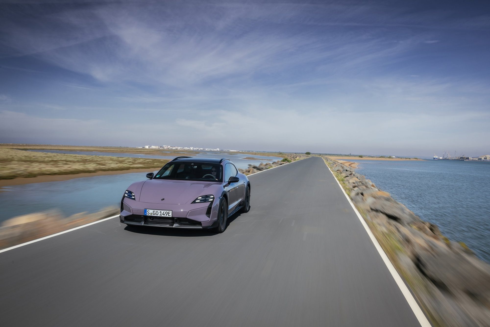 Taycan on a coast road