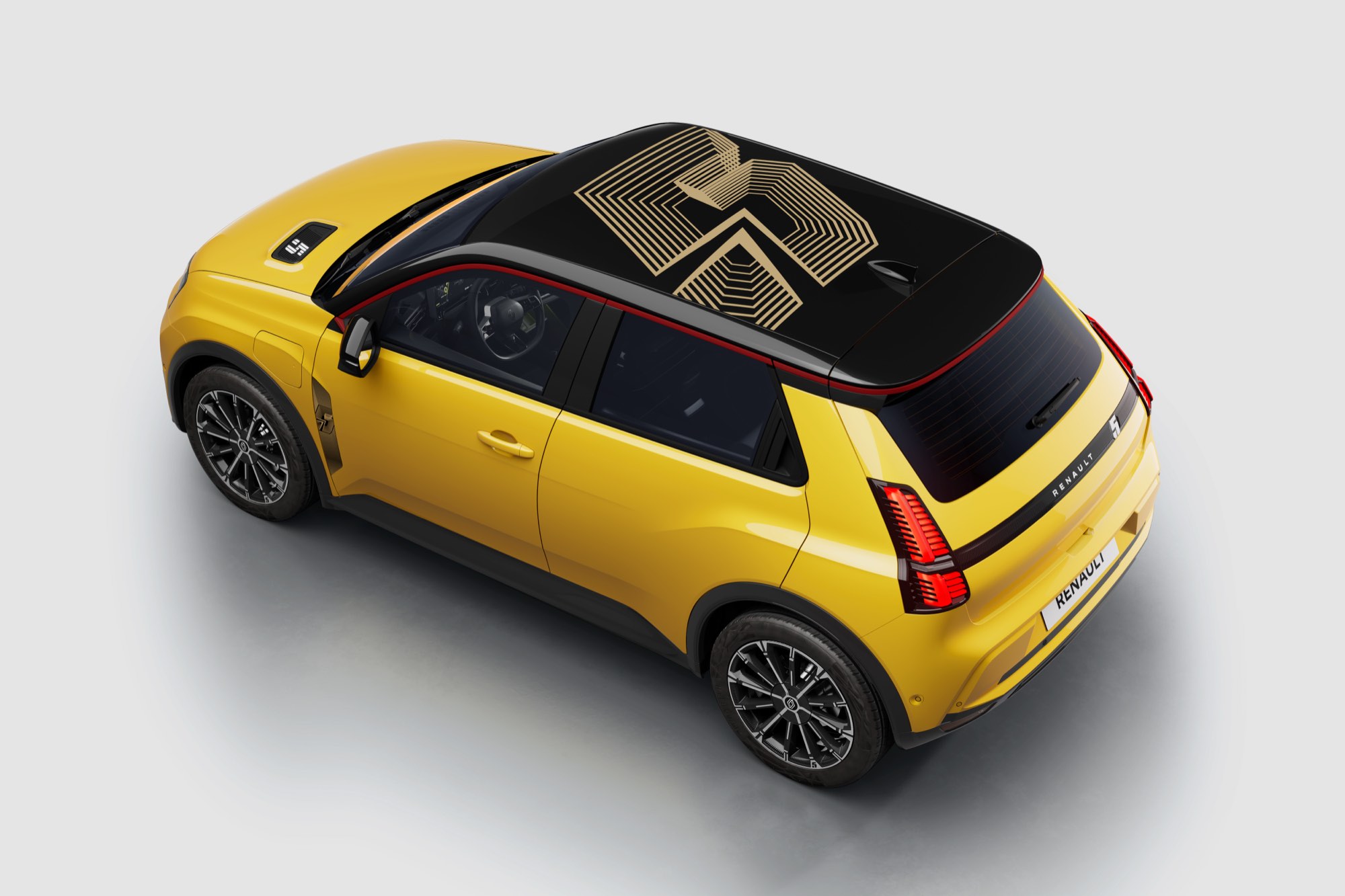 Pop Yellow under a diamond black roof, with a sticker pack across it