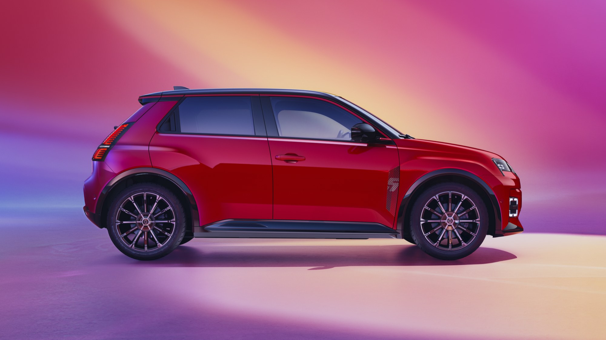 Flame Red from the side, on 18-inch chrono black wheels