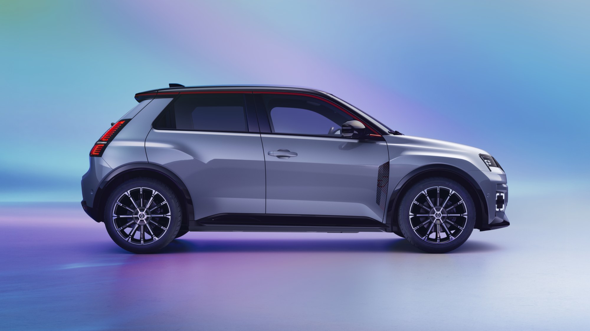 From the side, where the reworked lower body and door mirrors buy the extra miles