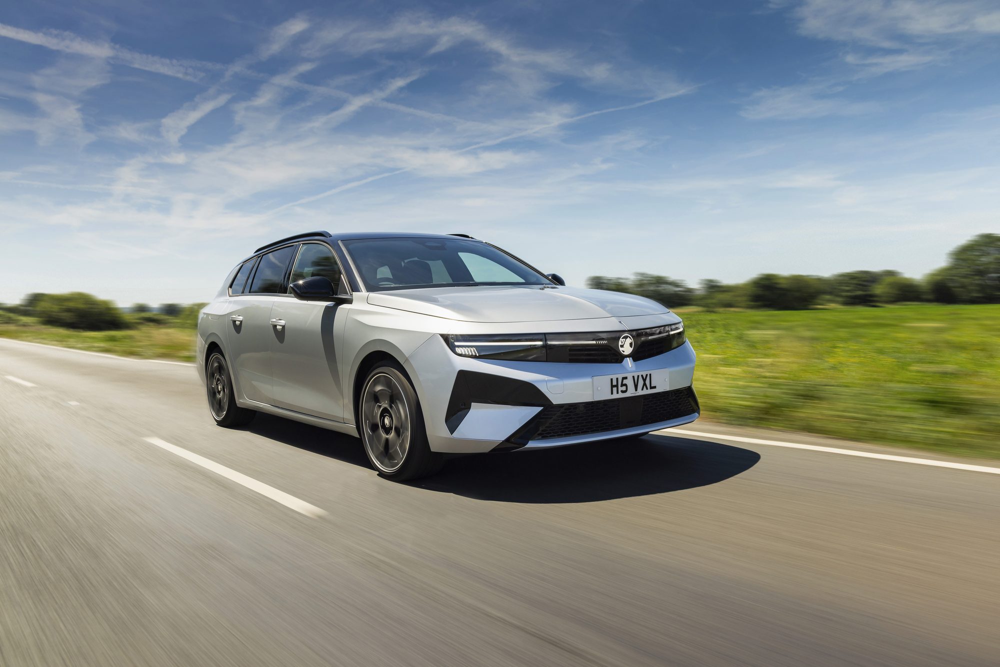 Astra Sports Tourer Electric in Crystal Silver, from behind