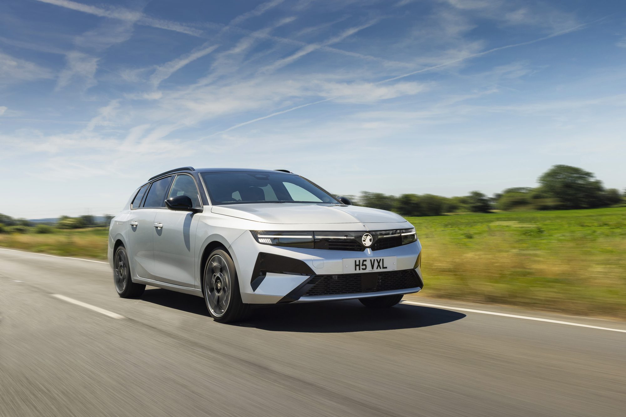 Astra Sports Tourer Electric in Crystal Silver, from the side
