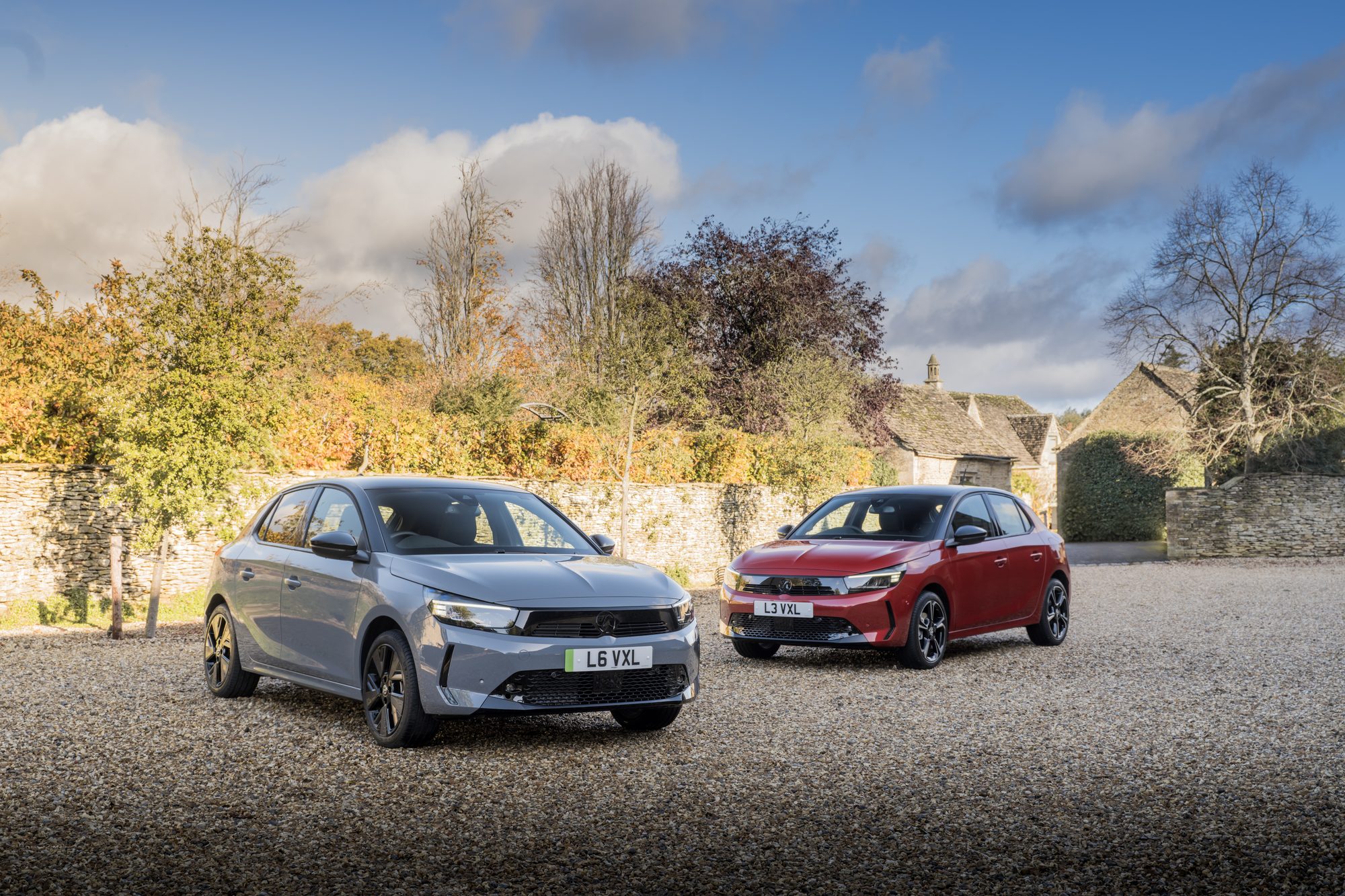 The Vauxhall Corsa Electric Ultimate, alongside a Corsa GS