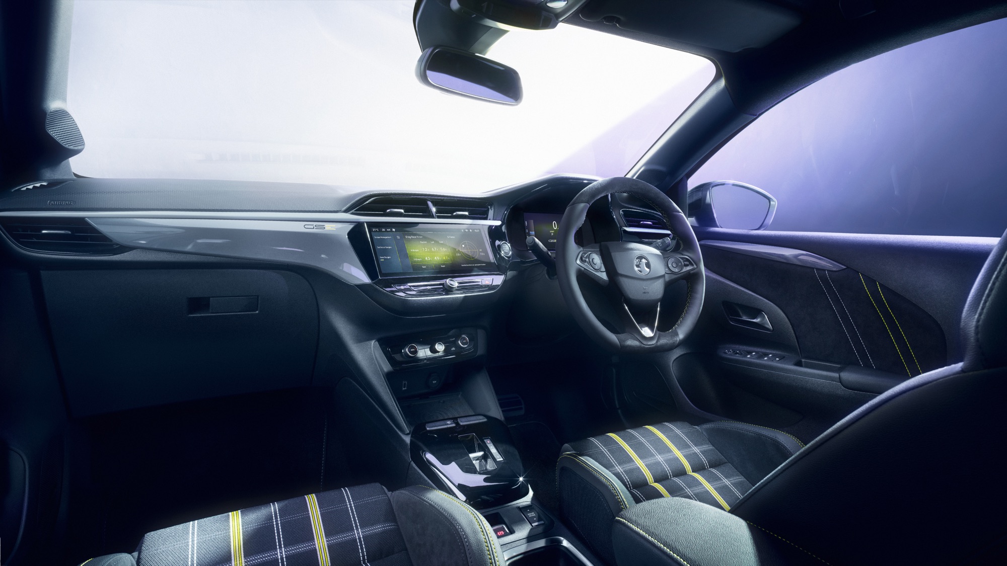 The cabin, with the yellow seat belts