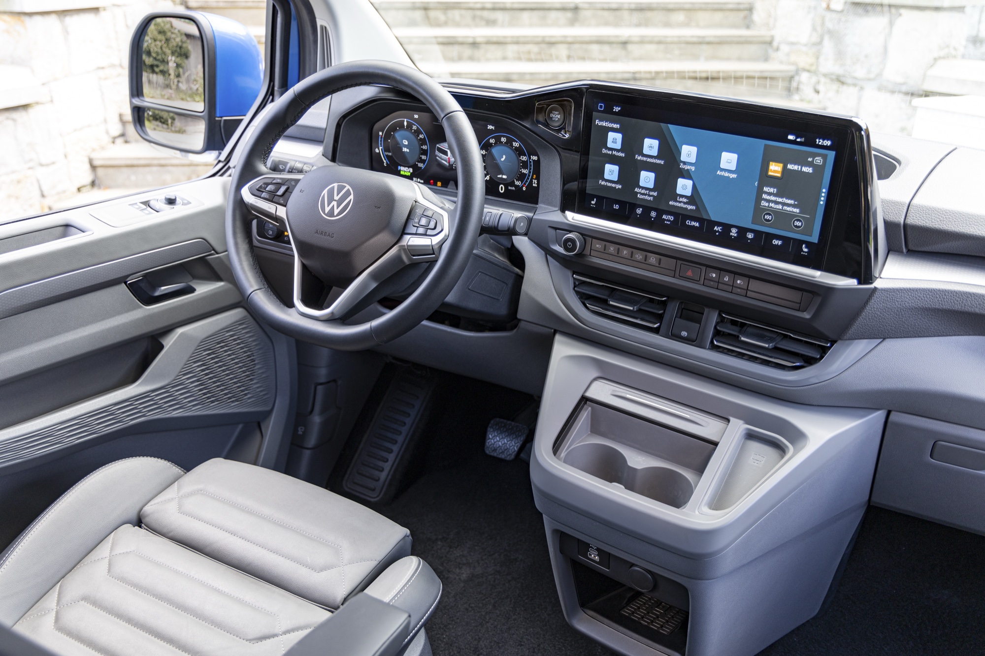 The electric Shuttle's dashboard, with 12" instruments and 13" touchscreen