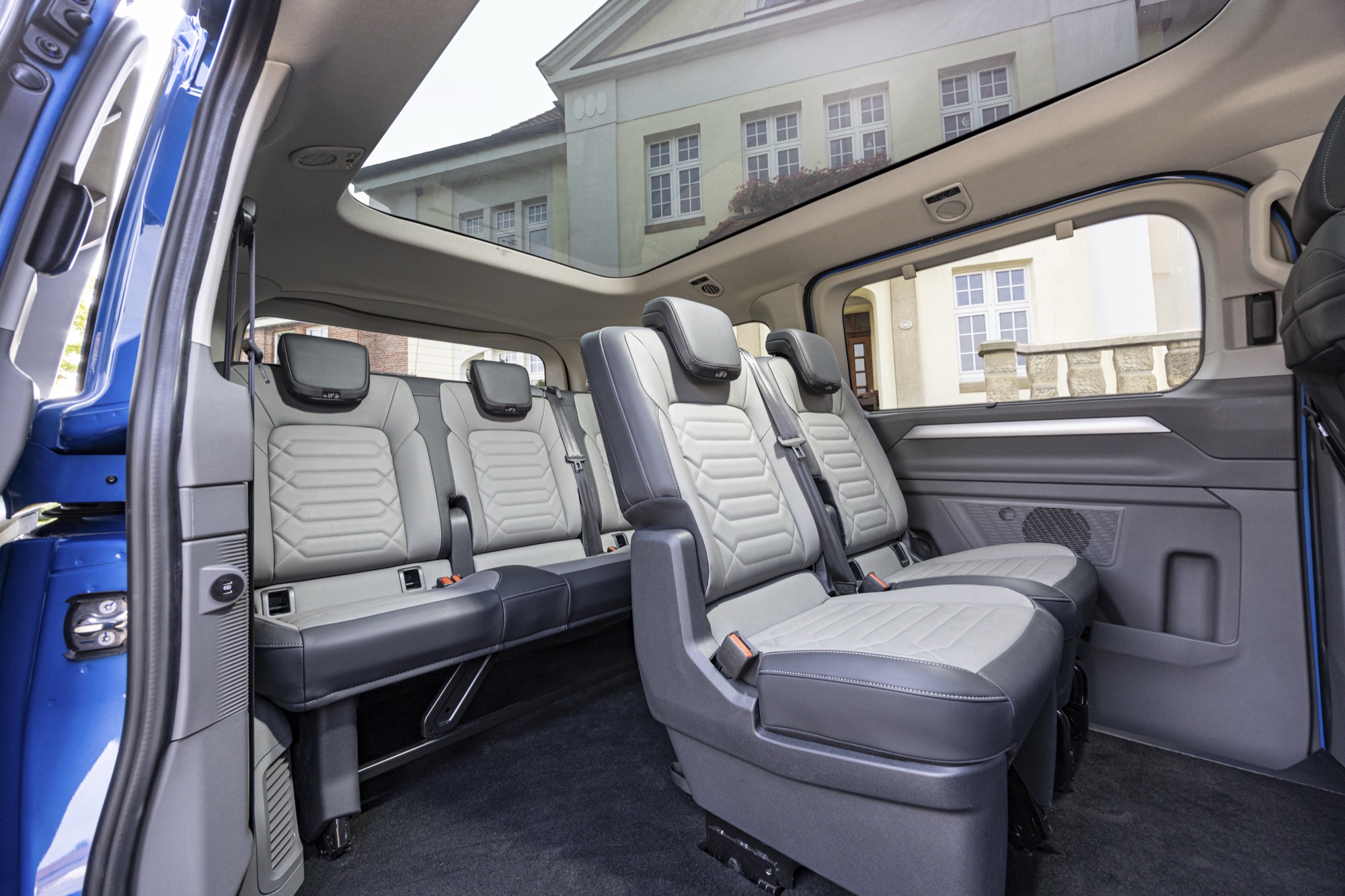 Second and third rows of the electric Transporter Shuttle, under the panoramic roof