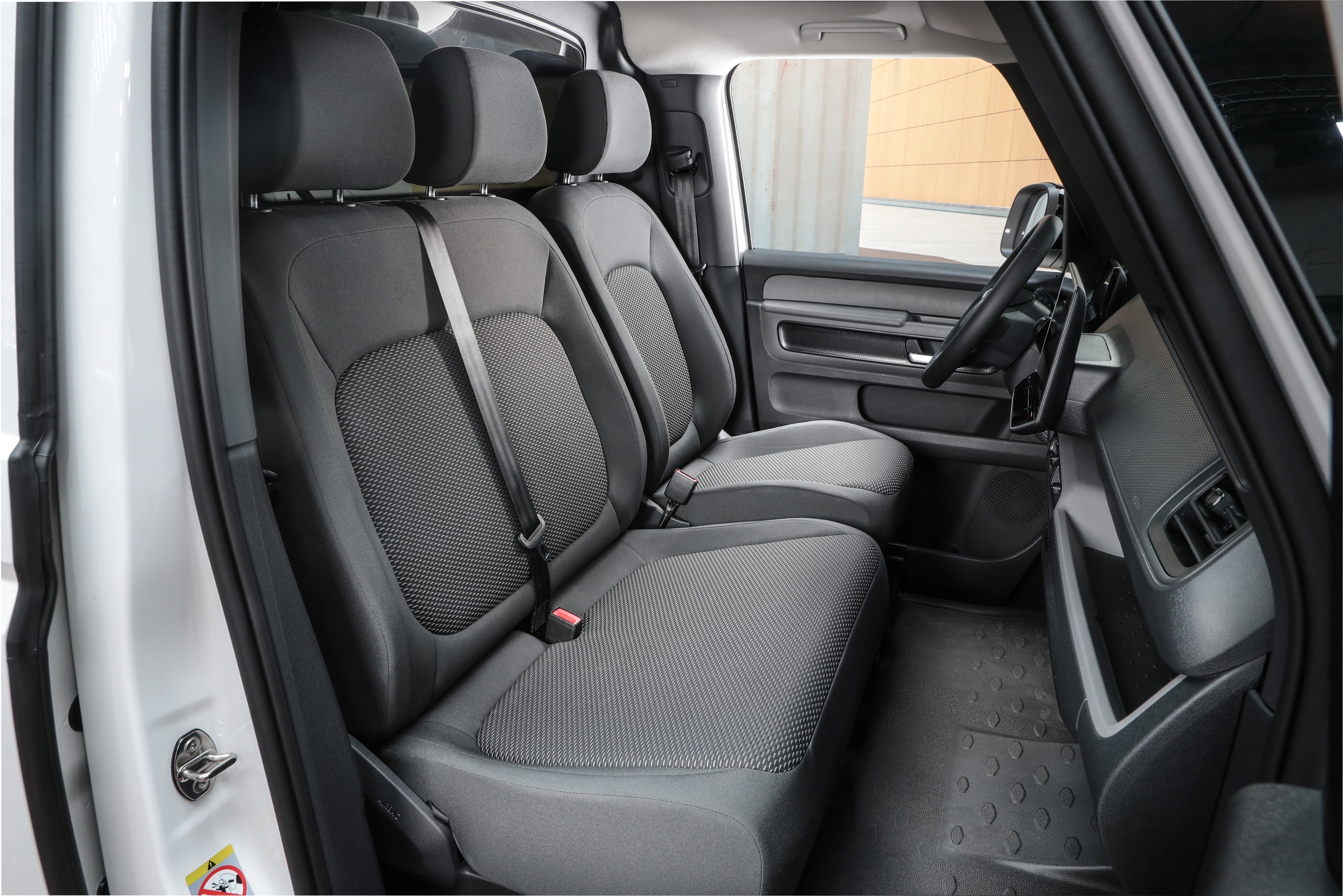 The three-seat cab
