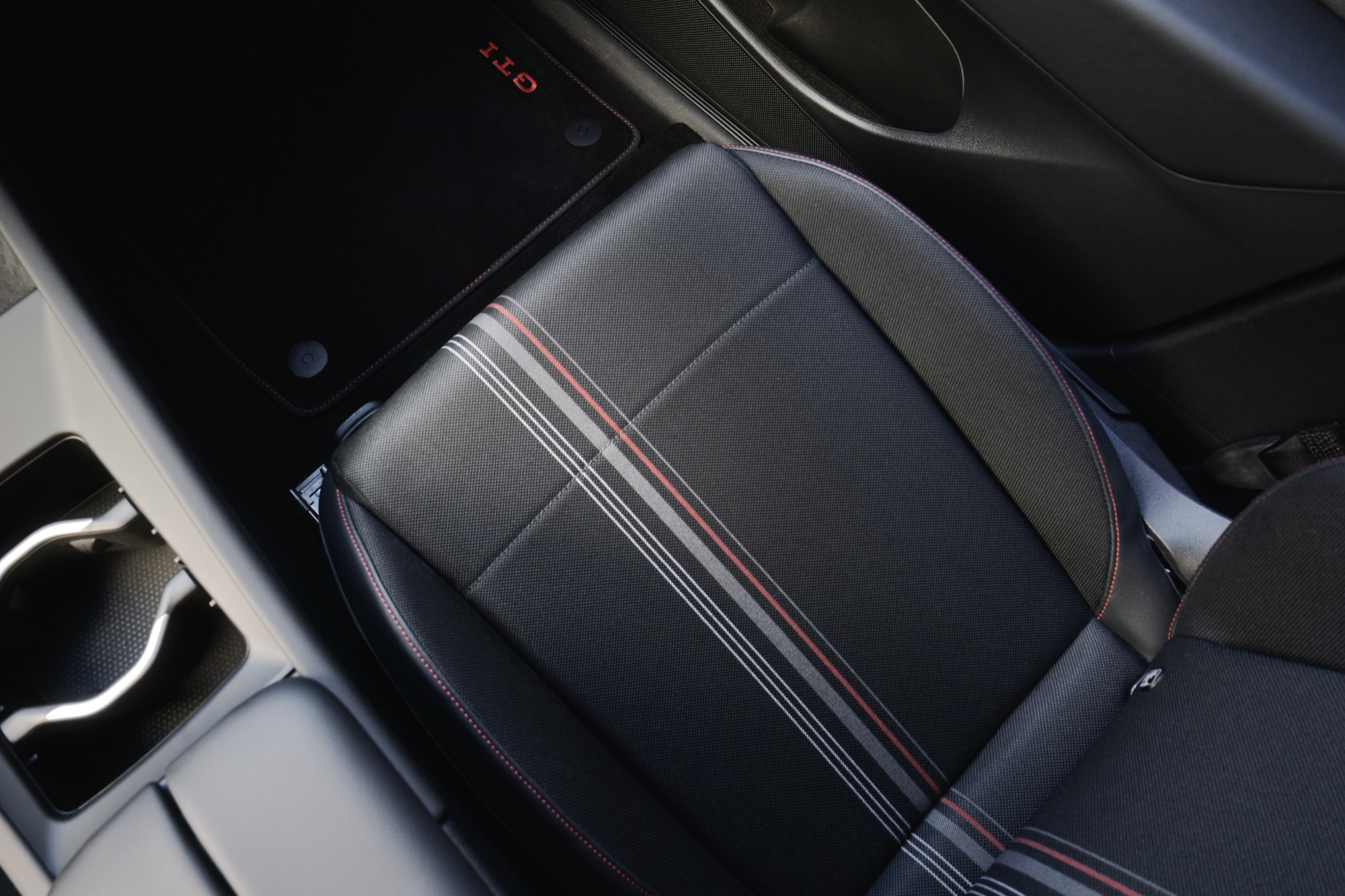 The tartan stripe across a seat cushion